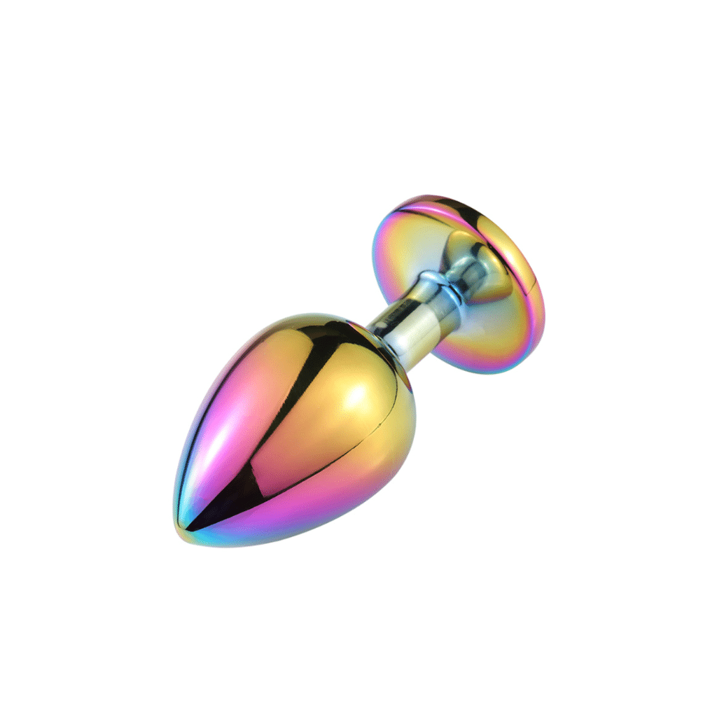 Metal rainbow colored butt plug with a red gem